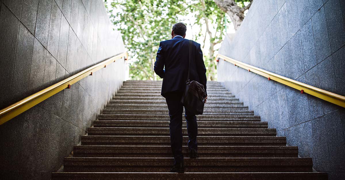 Businessman Climbing Stairs